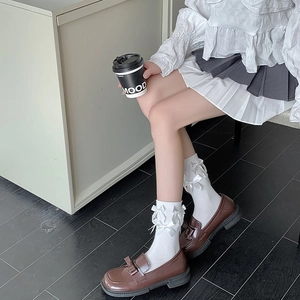 Japanese style white mid-calf socks with double bows and brown bow loafers for women