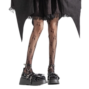 Collants résille blancs à nœuds noirs avec chaussures Mary Jane gothiques à plateforme