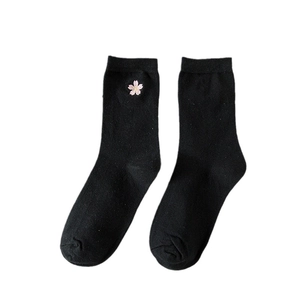 Black mid-calf cotton socks with delicate pink cherry blossom floral embroidery