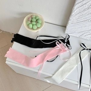 Jambières tricotées style japonais avec nœuds et volants en rose, blanc et noir