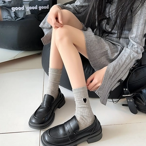 Japanese style gray heart embroidery crew socks paired with black leather loafers