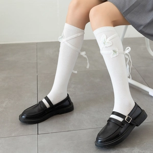 White Lolita JK socks with 3D butterfly embroidery and ribbon lace-up details