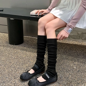 Japanese style black knit leg warmers paired with ballet flats for a trendy JK school look