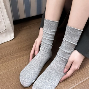 Classic grey cotton slouch socks for women, featuring soft ribbed knit texture and casual design
