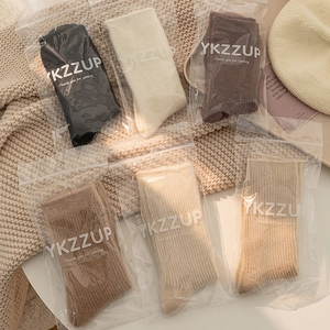 Thick knit socks in six colors with ribbed texture and individual zipper bag packaging