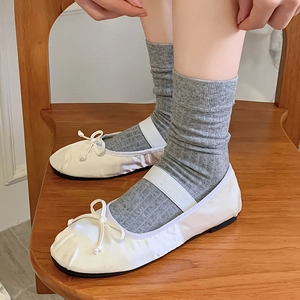 Japanese style white satin ballet flats with bow detail and grey knitted slouch socks