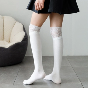 Japanese style white over-knee socks with delicate lace trim and vertical ribbed knit