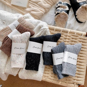 Five pairs of speckled knit thermal mid-calf socks in assorted colors for winter warmth