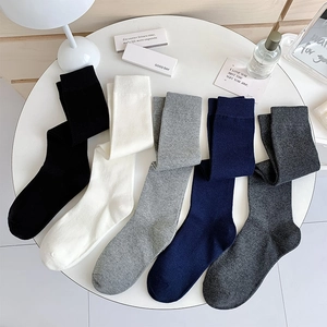 Detail showing five pairs of colorful Japanese style high socks in soft cotton knit fabric