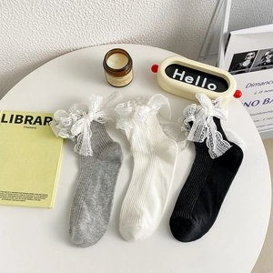 Lace bow mid-calf socks in black white and grey colors for women in a set
