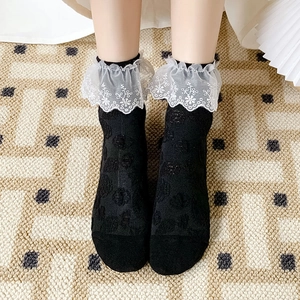 Japanese Lolita style black lace socks with white floral embroidery and floral pattern