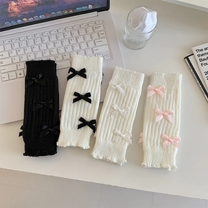 Jambières style Lolita japonaise en tricot côtelé avec des nœuds noirs et blancs