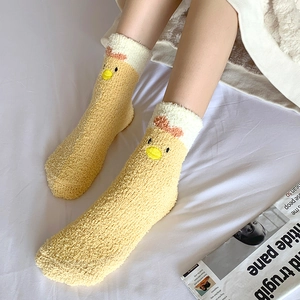 Thick coral fleece socks for women featuring a yellow cartoon chick design and warm plush fabric
