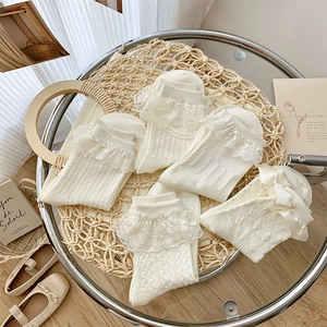 5 pairs of off-white Lolita style lace socks with ribbons and delicate floral patterns