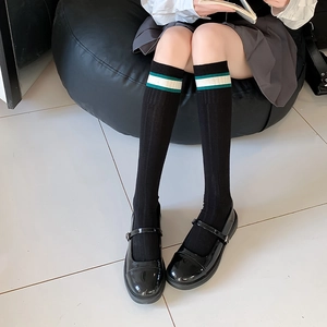 Japanese style white calf-length socks with green stripes and ribbed texture for women
