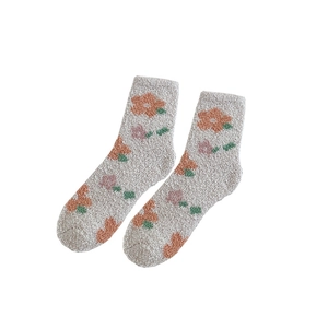 Spesse calze in pile corallo da donna con motivi floreali rosa e arancioni su grigio