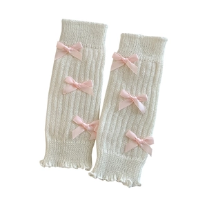 Jambières blanches tricotées style Lolita avec nœuds roses et bords ondulés