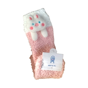Pink and white coral fleece thermal socks with 3D cartoon bunny plush and tag