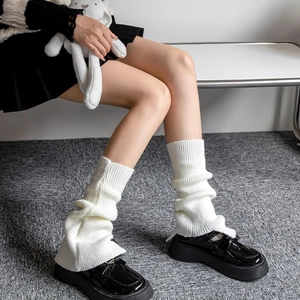 White knit leg warmers with vertical ribbed texture for women in JK style and autumn winter wear