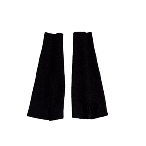 Knitted black leg warmers with thumb holes for women in a trendy minimalist design