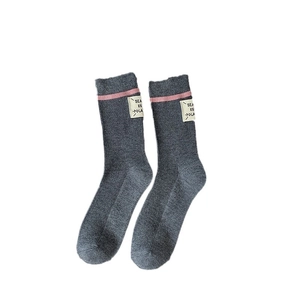 Cozy Japanese style dark grey wool socks with pink stripe and decorative label