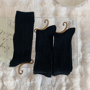 Three-pair pack of black ribbed cotton crew socks with premium gold metal display hooks