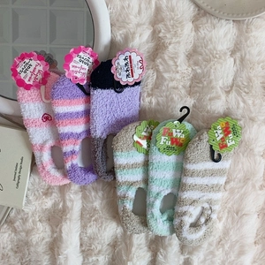 Thick coral fleece socks for women featuring cute pink stripes and warm fluffy texture