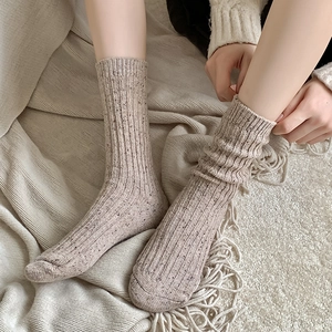 Chic beige wool ribbed crew socks with textured speckles for cozy winter comfort