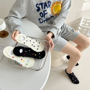 Breathable mesh boat socks for women featuring colorful polka dots and non-slip silicone grip