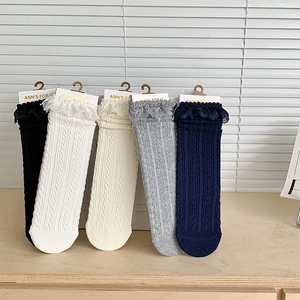 Detail of five assorted colors cotton Lolita socks with lace trim and ribbed texture