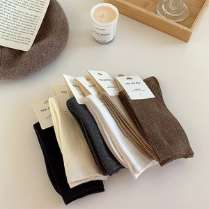 Detailed set of 6 rib-knit cotton crew socks in neutral tones with minimalist packaging