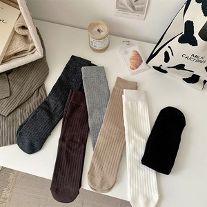 6 pairs of solid color ribbed cotton mid-calf socks in earthy autumn and winter tones