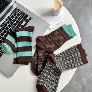 Three-pack vintage brown and green striped cotton socks with geometric patterns