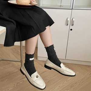 Japanese style frilly socks in cream white paired with classic leather loafers