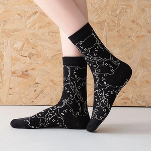 Black mid-calf socks with cute white cat patterns and comfortable ribbed cuffs