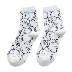White crew socks featuring all-over cute black cartoon cat patterns for women