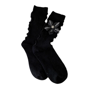 Black knit crew socks with chic ribbon flower and vintage button on ruffled cuffs