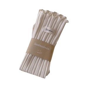 Japanese style cream white ribbed socks with ruffle edges and cute smile label