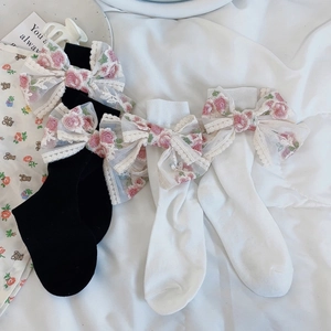 Set di calze stile Lolita in bianco e nero con fiocchi in pizzo e ricami floreali