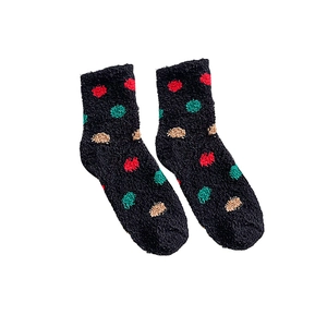 Thick coral fleece crew socks in black with colorful polka dots for winter warmth