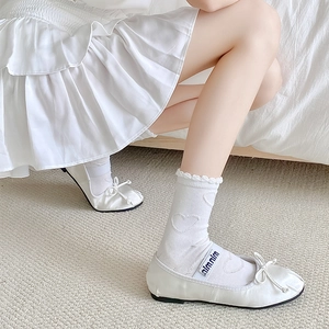 White heart jacquard mid-calf socks paired with satin ballet flats in a sweet girlish style