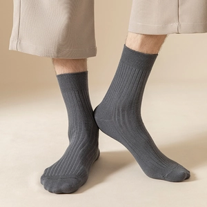 Close-up of grey ribbed knit texture and reinforced toe on these men's crew socks