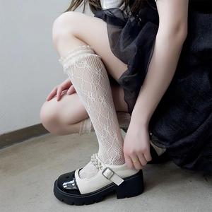 Lolita style white lace knee-high socks with mesh ruffles and pearl platform shoes