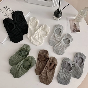 Detailed view of six-color low-cut invisible socks with breathable vertical striped texture