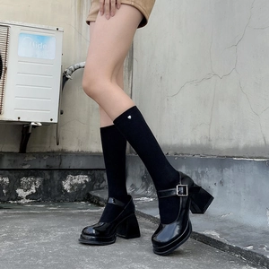 Retro black patent leather Mary Jane platform pumps with thick high heels and ankle straps