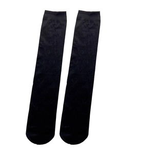 Chaussettes montantes noires classiques pour femmes en velours ultra-fin et élastique