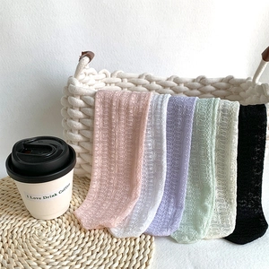 Set of six colorful lace mesh socks featuring delicate floral patterns and breathable texture