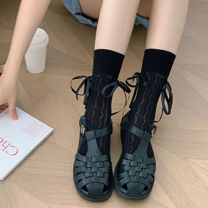 Sweet ballet style white mesh socks with ribbon bows and black woven T-strap sandals