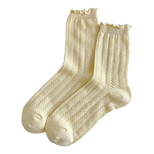 Breathable mesh crew socks for women featuring pointelle knit and ruffled edges in beige