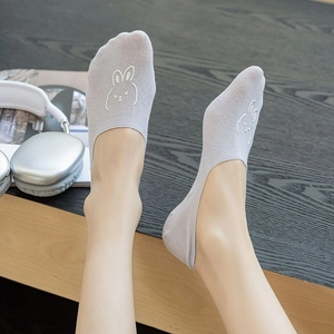 Detail of light purple no-show sock featuring cute white rabbit embroidery on the toe